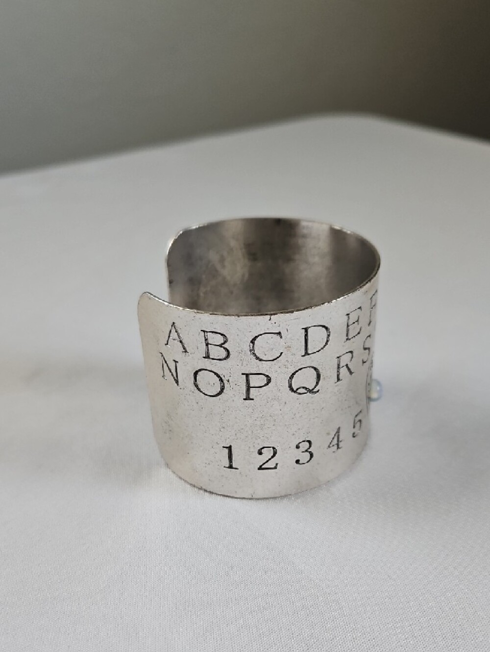 Hot Topic Silver Ouija-Style Alphabet Cuff Bracelet - Picture 2 of 7